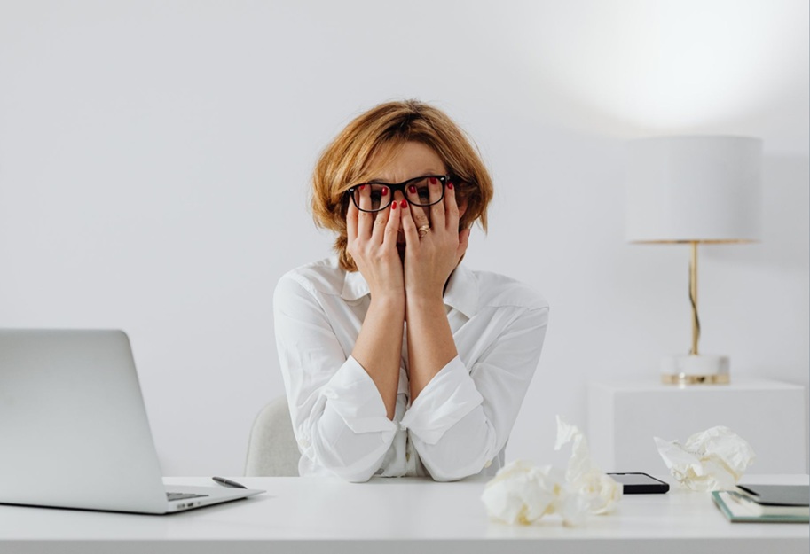 Woman experiencing content burnout