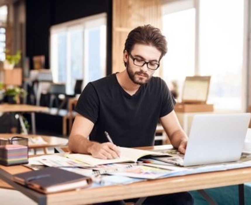 Business man reviewing repetitive content